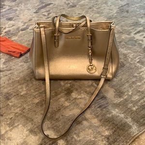 Micheal Koran’s purse. Gold gorgeous